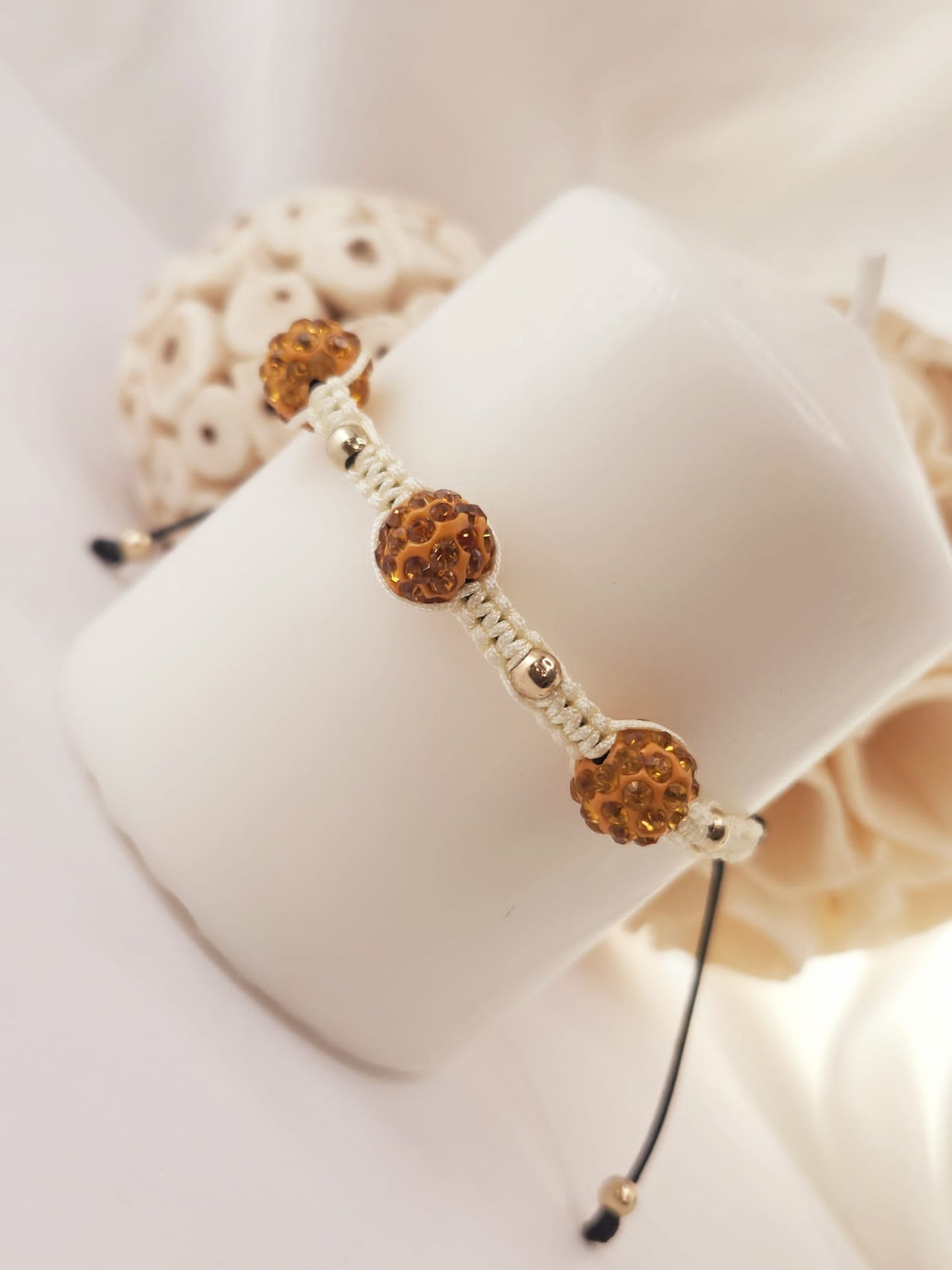 Pulseras de cuentas de arcilla con cristales
