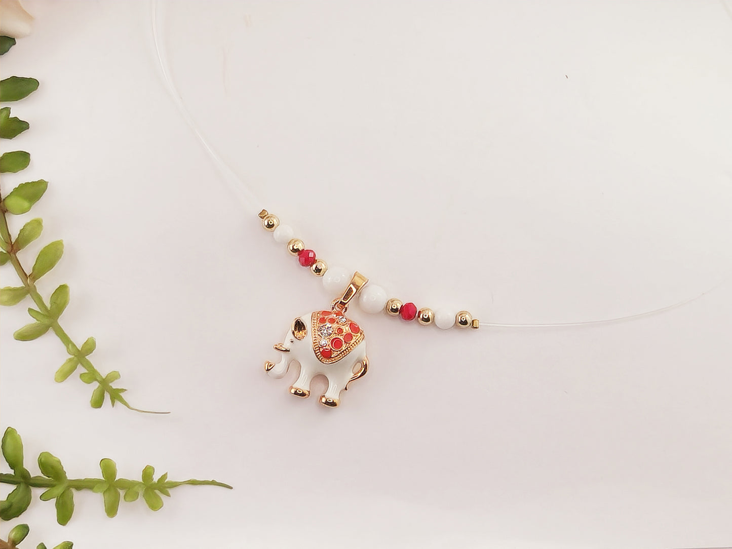 Invisible Thread Necklace - Gold Plated White Elephant Pendant