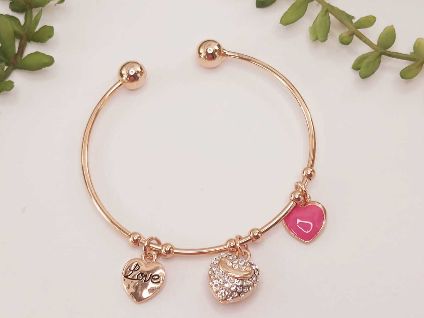 Pulsera Rosa Chapada en Oro con Corazon