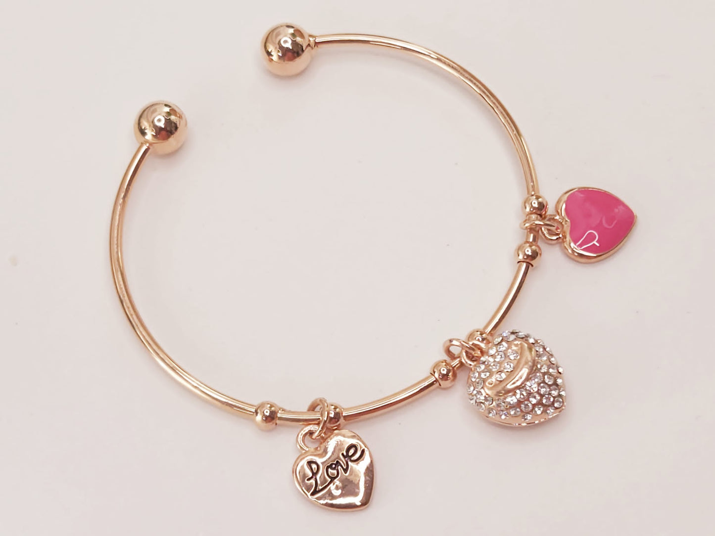 Pulsera Rosa Chapada en Oro con Corazon